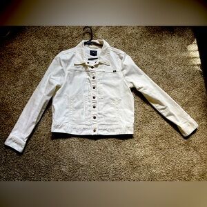 Women’s white jean jacket.